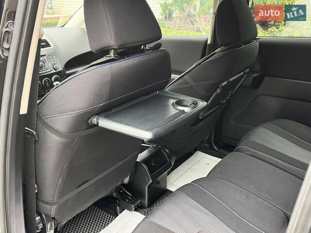 Черный Мазда 5, объемом двигателя 2 л и пробегом 231 тыс. км за 7999 $, фото 64 на Automoto.ua