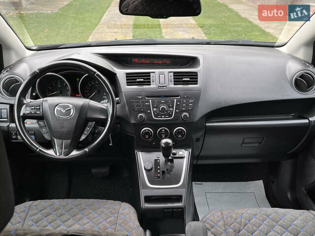 Мазда 5 2010 у Києві на Automoto.ua Чорний Мазда 5, об'ємом двигуна 2 л та пробігом 218 тис. км за 7999 $, фото 74 на Automoto.ua