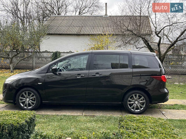 Черный Мазда 5, объемом двигателя 2 л и пробегом 231 тыс. км за 7699 $, фото 11 на Automoto.ua