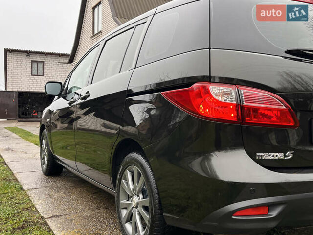 Чорний Мазда 5, об'ємом двигуна 2 л та пробігом 231 тис. км за 7999 $, фото 25 на Automoto.ua