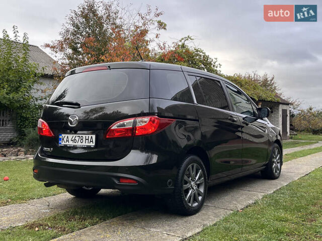 Черный Мазда 5, объемом двигателя 2 л и пробегом 231 тыс. км за 7999 $, фото 1 на Automoto.ua