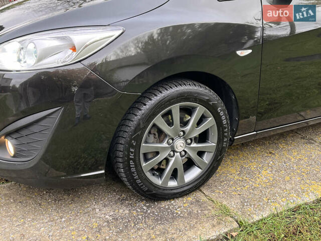 Мазда 5 2010 у Києві на Automoto.ua Чорний Мазда 5, об'ємом двигуна 2 л та пробігом 218 тис. км за 7999 $, фото 36 на Automoto.ua