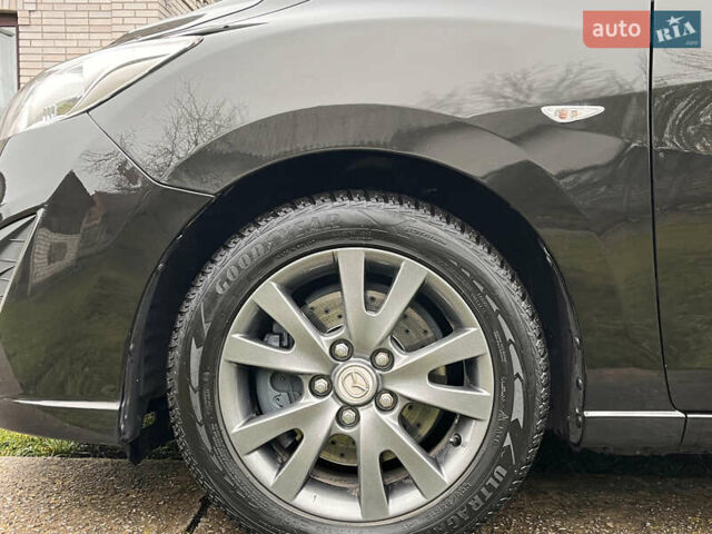 Чорний Мазда 5, об'ємом двигуна 2 л та пробігом 231 тис. км за 7999 $, фото 23 на Automoto.ua