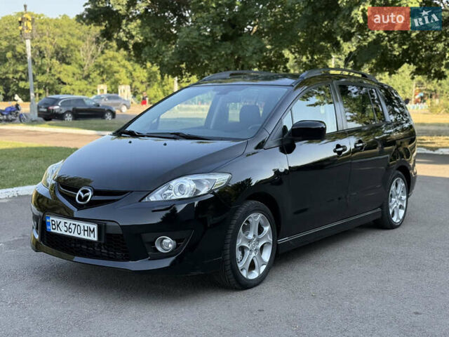 Черный Мазда 5, объемом двигателя 2 л и пробегом 231 тыс. км за 5999 $, фото 1 на Automoto.ua