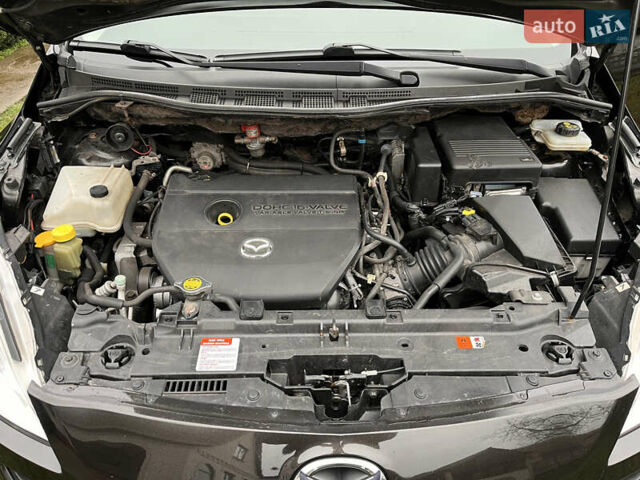 Чорний Мазда 5, об'ємом двигуна 2 л та пробігом 231 тис. км за 7999 $, фото 69 на Automoto.ua