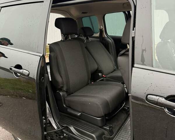 Чорний Мазда 5, об'ємом двигуна 2 л та пробігом 214 тис. км за 7000 $, фото 8 на Automoto.ua