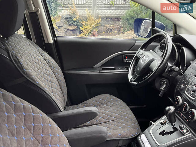 Чорний Мазда 5, об'ємом двигуна 2 л та пробігом 231 тис. км за 7999 $, фото 64 на Automoto.ua