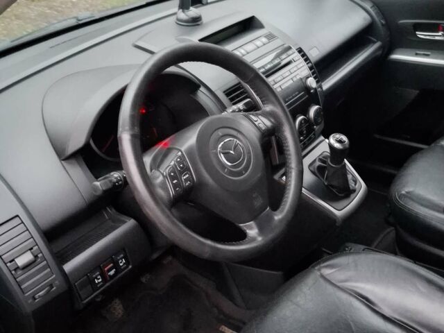 Черный Мазда 5, объемом двигателя 2 л и пробегом 210 тыс. км за 6200 $, фото 5 на Automoto.ua
