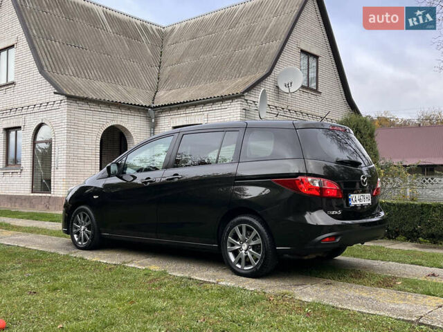 Черный Мазда 5, объемом двигателя 2 л и пробегом 231 тыс. км за 7999 $, фото 24 на Automoto.ua