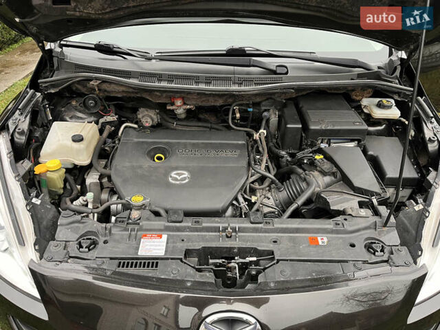 Чорний Мазда 5, об'ємом двигуна 2 л та пробігом 231 тис. км за 7999 $, фото 68 на Automoto.ua