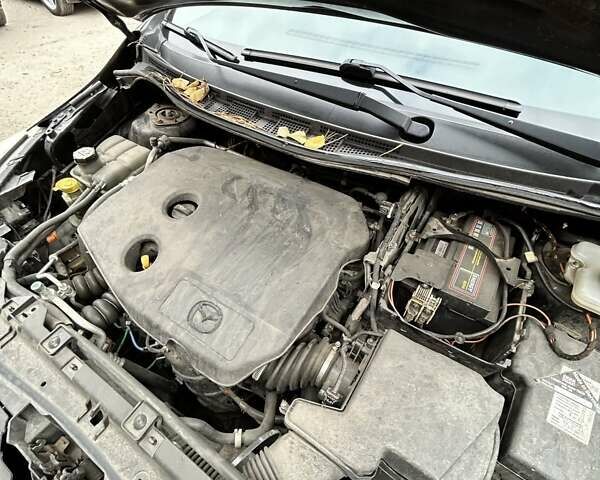 Черный Мазда 5, объемом двигателя 1.56 л и пробегом 274 тыс. км за 7000 $, фото 30 на Automoto.ua