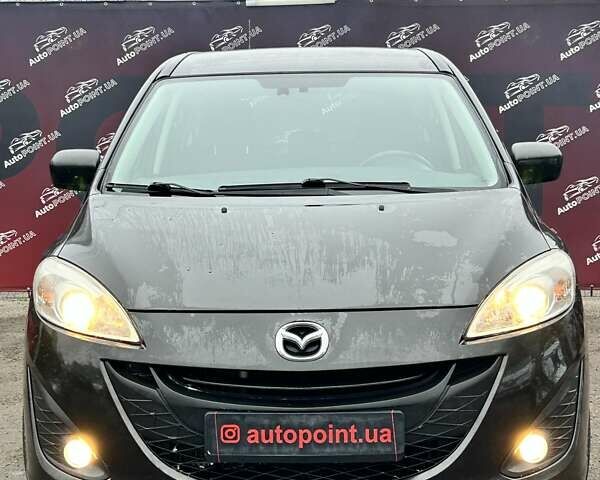 Черный Мазда 5, объемом двигателя 1.56 л и пробегом 274 тыс. км за 6500 $, фото 1 на Automoto.ua