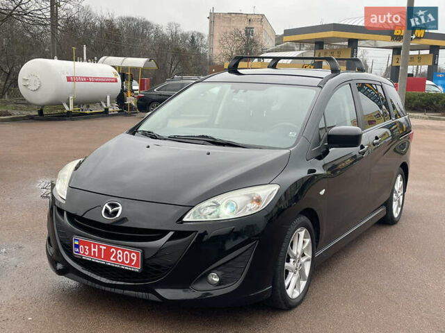 Черный Мазда 5, объемом двигателя 2 л и пробегом 210 тыс. км за 8100 $, фото 2 на Automoto.ua