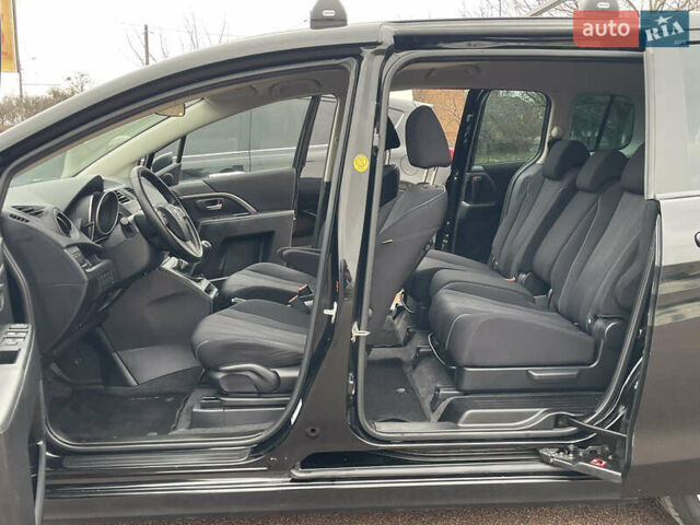Черный Мазда 5, объемом двигателя 2 л и пробегом 210 тыс. км за 8100 $, фото 26 на Automoto.ua