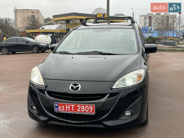 Черный Мазда 5, объемом двигателя 2 л и пробегом 210 тыс. км за 8100 $, фото 4 на Automoto.ua