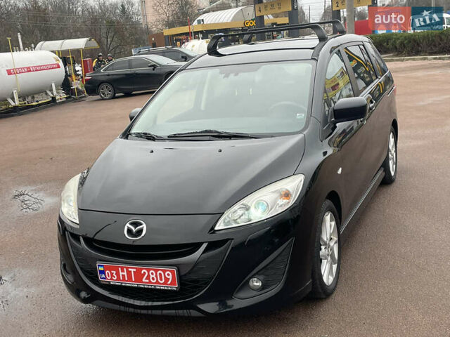 Черный Мазда 5, объемом двигателя 2 л и пробегом 210 тыс. км за 8100 $, фото 3 на Automoto.ua