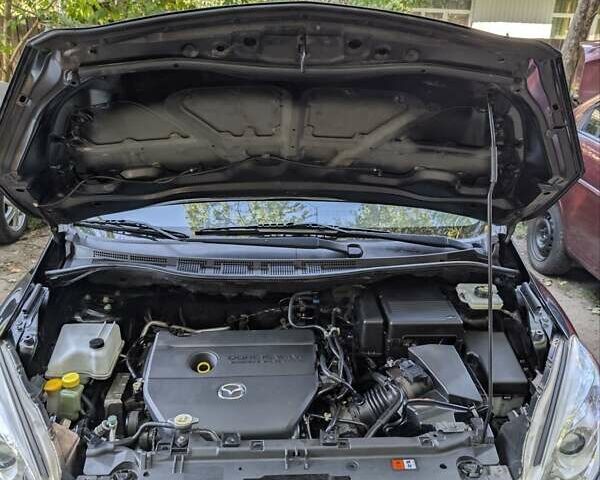 Черный Мазда 5, объемом двигателя 1.8 л и пробегом 216 тыс. км за 8500 $, фото 28 на Automoto.ua