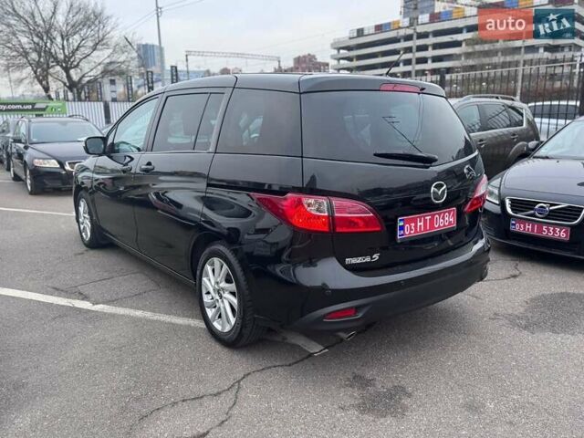 Черный Мазда 5, объемом двигателя 1.8 л и пробегом 171 тыс. км за 11000 $, фото 8 на Automoto.ua