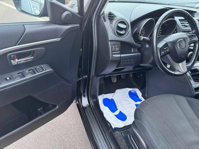 Черный Мазда 5, объемом двигателя 1.8 л и пробегом 171 тыс. км за 11000 $, фото 21 на Automoto.ua