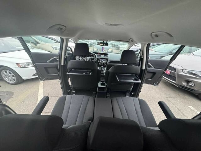 Черный Мазда 5, объемом двигателя 1.8 л и пробегом 171 тыс. км за 11000 $, фото 19 на Automoto.ua