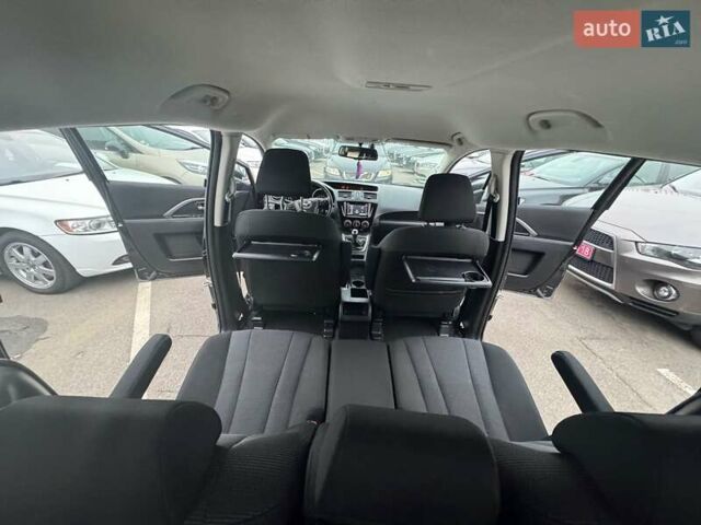 Черный Мазда 5, объемом двигателя 1.8 л и пробегом 171 тыс. км за 11000 $, фото 20 на Automoto.ua