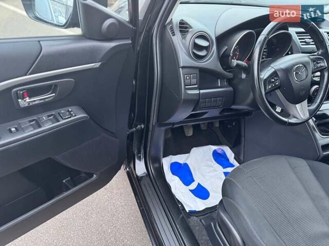 Черный Мазда 5, объемом двигателя 1.8 л и пробегом 171 тыс. км за 11000 $, фото 22 на Automoto.ua