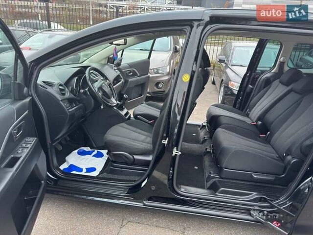 Черный Мазда 5, объемом двигателя 1.8 л и пробегом 171 тыс. км за 11000 $, фото 19 на Automoto.ua