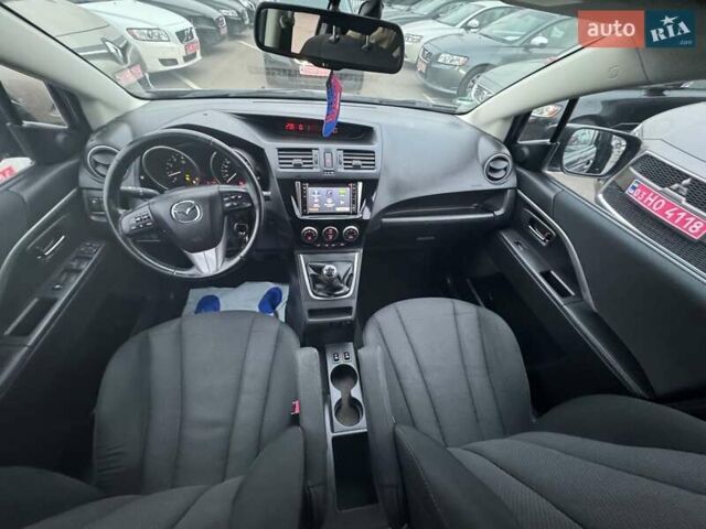 Черный Мазда 5, объемом двигателя 1.8 л и пробегом 171 тыс. км за 11000 $, фото 1 на Automoto.ua