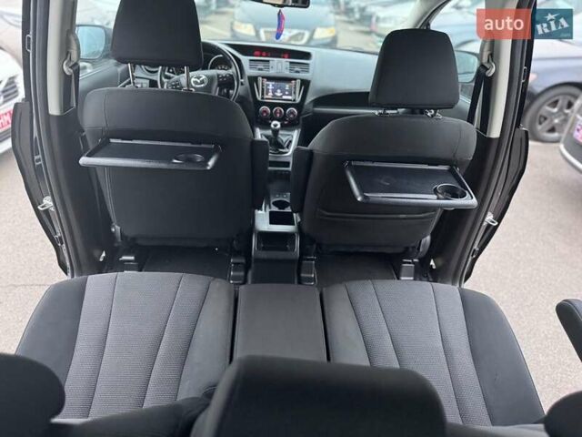 Черный Мазда 5, объемом двигателя 1.8 л и пробегом 171 тыс. км за 11000 $, фото 32 на Automoto.ua