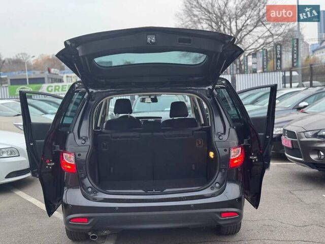 Черный Мазда 5, объемом двигателя 1.8 л и пробегом 171 тыс. км за 11000 $, фото 17 на Automoto.ua