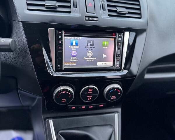 Черный Мазда 5, объемом двигателя 1.8 л и пробегом 171 тыс. км за 11000 $, фото 35 на Automoto.ua