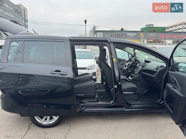 Черный Мазда 5, объемом двигателя 1.8 л и пробегом 171 тыс. км за 11000 $, фото 15 на Automoto.ua