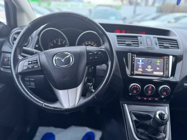 Черный Мазда 5, объемом двигателя 1.8 л и пробегом 171 тыс. км за 11000 $, фото 1 на Automoto.ua