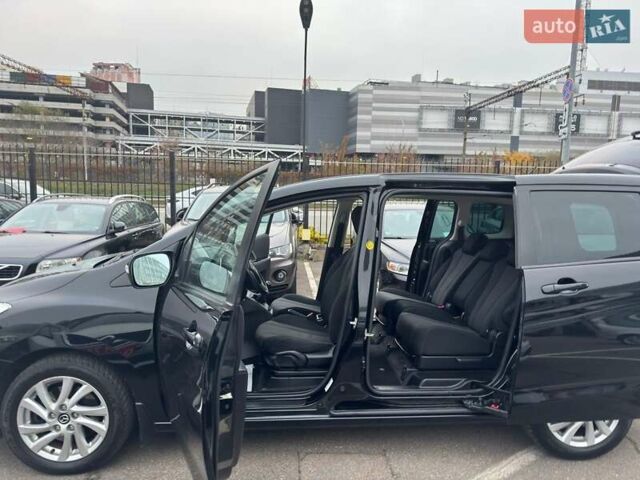 Черный Мазда 5, объемом двигателя 1.8 л и пробегом 171 тыс. км за 11000 $, фото 18 на Automoto.ua
