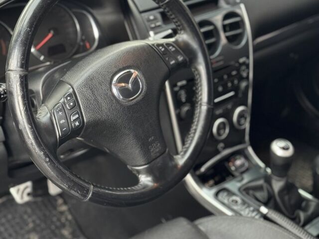 Черный Мазда 5, объемом двигателя 2.3 л и пробегом 255 тыс. км за 6300 $, фото 10 на Automoto.ua