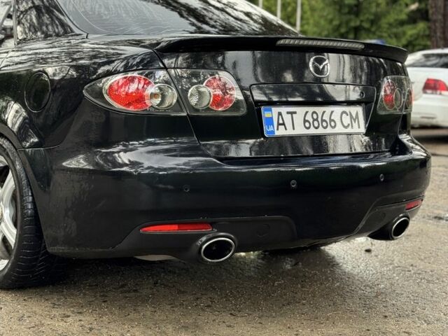 Черный Мазда 5, объемом двигателя 2.3 л и пробегом 255 тыс. км за 6300 $, фото 6 на Automoto.ua