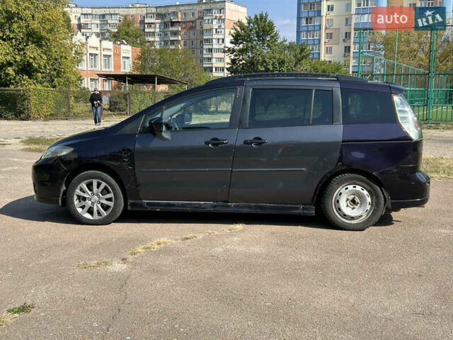 Фиолетовый Мазда 5, объемом двигателя 2 л и пробегом 200 тыс. км за 2999 $, фото 6 на Automoto.ua
