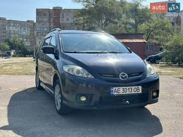 Фиолетовый Мазда 5, объемом двигателя 2 л и пробегом 200 тыс. км за 2999 $, фото 2 на Automoto.ua