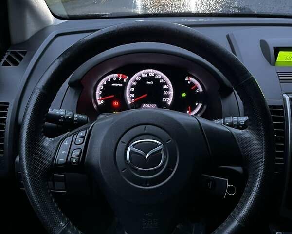 Фиолетовый Мазда 5, объемом двигателя 1.8 л и пробегом 250 тыс. км за 5700 $, фото 8 на Automoto.ua