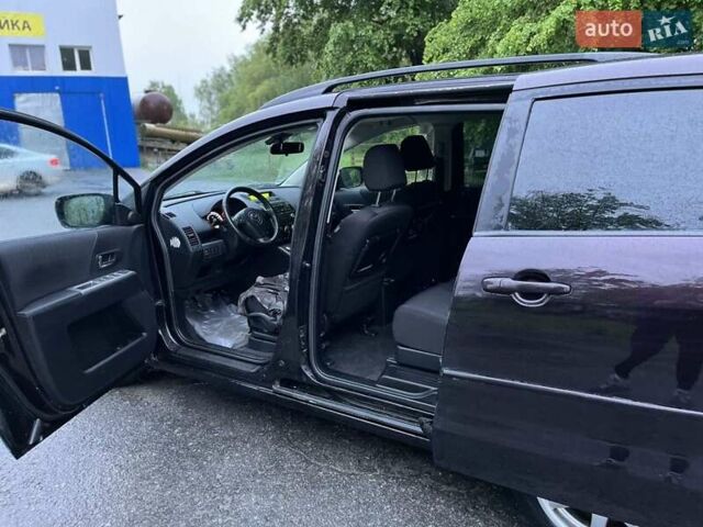 Фиолетовый Мазда 5, объемом двигателя 1.8 л и пробегом 250 тыс. км за 5700 $, фото 16 на Automoto.ua