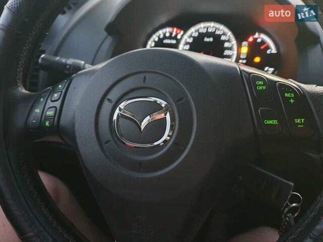 Коричневий Мазда 5, об'ємом двигуна 2 л та пробігом 270 тис. км за 3999 $, фото 10 на Automoto.ua
