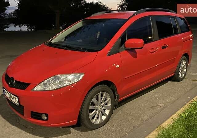 Красный Мазда 5, объемом двигателя 2 л и пробегом 320 тыс. км за 3900 $, фото 1 на Automoto.ua