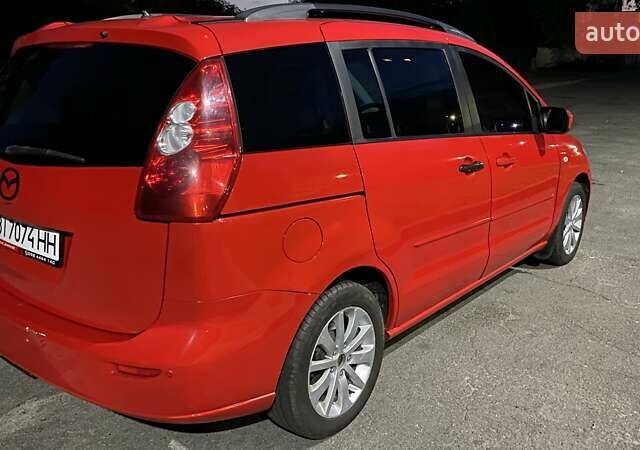 Красный Мазда 5, объемом двигателя 2 л и пробегом 320 тыс. км за 3900 $, фото 5 на Automoto.ua