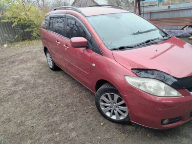 Красный Мазда 5, объемом двигателя 2 л и пробегом 210 тыс. км за 6500 $, фото 1 на Automoto.ua