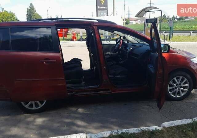 Красный Мазда 5, объемом двигателя 2 л и пробегом 222 тыс. км за 5800 $, фото 1 на Automoto.ua