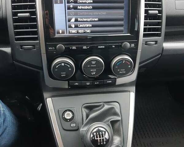 Мазда 5, объемом двигателя 2 л и пробегом 227 тыс. км за 6100 $, фото 4 на Automoto.ua