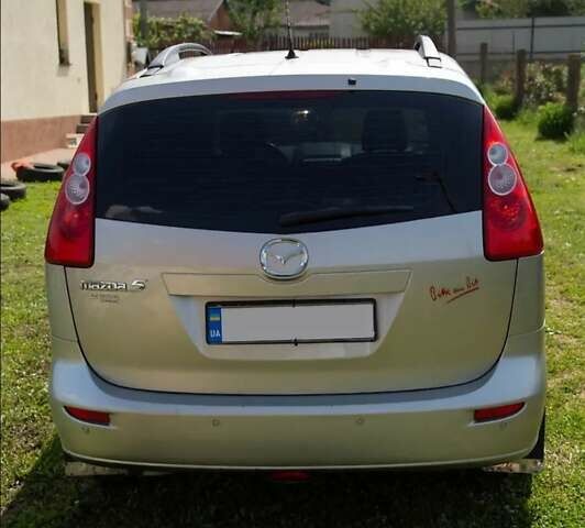 Желтый Мазда 5, объемом двигателя 2 л и пробегом 255 тыс. км за 4500 $, фото 19 на Automoto.ua