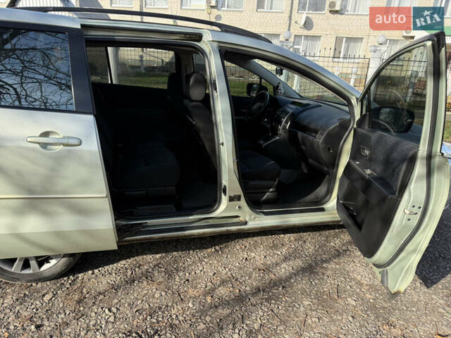 Жовтий Мазда 5, об'ємом двигуна 2 л та пробігом 238 тис. км за 6800 $, фото 33 на Automoto.ua