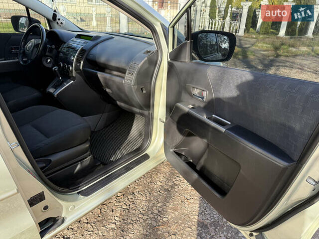 Жовтий Мазда 5, об'ємом двигуна 2 л та пробігом 238 тис. км за 6800 $, фото 37 на Automoto.ua