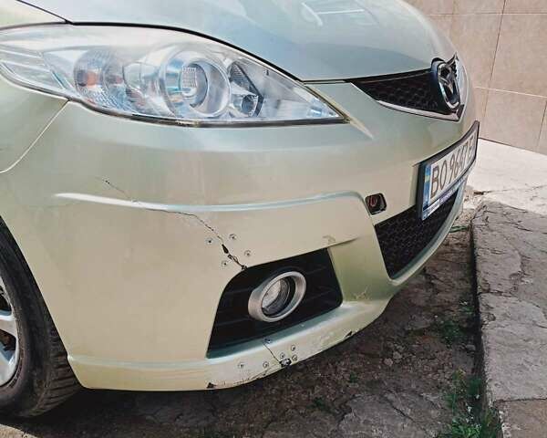 Желтый Мазда 5, объемом двигателя 2 л и пробегом 285 тыс. км за 5700 $, фото 4 на Automoto.ua